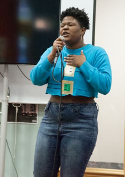 Teen performs at YOUmedia's Lyricist Loft